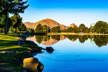 Camelback mountain reflected in the lake