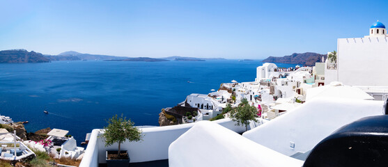 Panoramic view of part of the Island of Santorini from the town of Oya, in the background on the right you can see a conglomerate of people taking the typical photo, Cyclades Islands, Greece