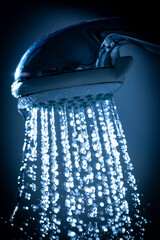 Water flowing from shower - close up - macro detail - high speed photo