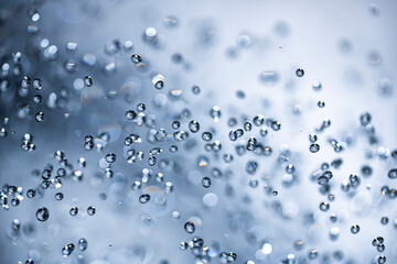 Falling water drops - rain in macro detail