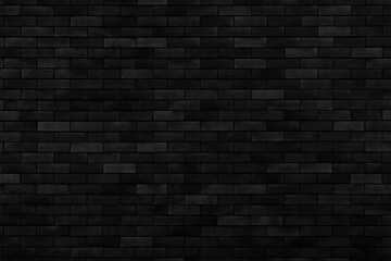Black brick wall of building. Brick texture. Architectural abstract black background.