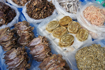Dried fish and seafood for sale in market, Laos