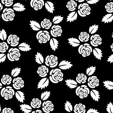 White roses on a black background.
