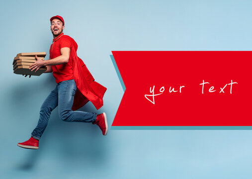 Deliveryman with pizzas acts like a powerful superhero. Concept of success and guarantee on shipment. Studio cyan background
