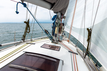 sea view from the deck of a white sailing yacht