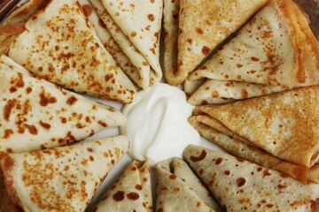 Delicious fresh crepe with sour cream macro
