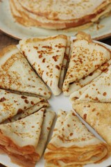 Delicious fresh crepe on the plate macro