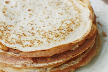 Delicious fresh crepe on the plate macro