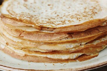 Delicious fresh crepe on the plate macro