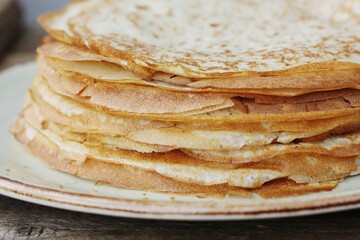 Delicious fresh crepe on the plate macro