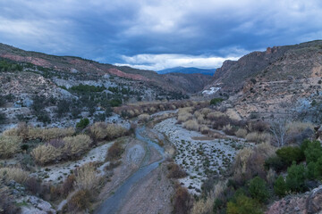Darrical river passing between mountains