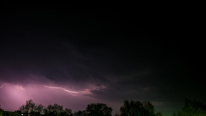 Obraz na płótnie Canvas Lightning bolts in the night sky