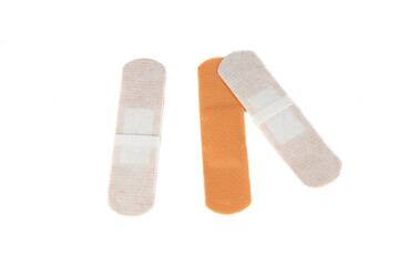Adhesive plaster isolated on white background. Healing wounds, scratches, sadin.
