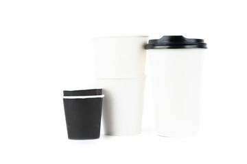 A row of paper coffee cups on a white background.Glasses for coffee and tea of different sizes isolated on white background. Hot coffee, starbucks.