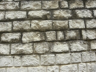 Gray rustic concrete brick wall textured background