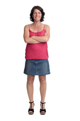 woman in a denim skirt on white background, arms crossed