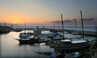 Fototapeta premium Harbor at sunset in Kyrenia (Girne), North Cyprus.
