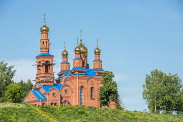 Fototapeta na wymiar orthodox church under construction from red brick
