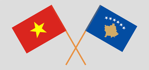 Crossed flags of Kosovo and Vietnam