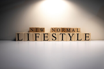 New normal lifestyle text from wooden cubes.