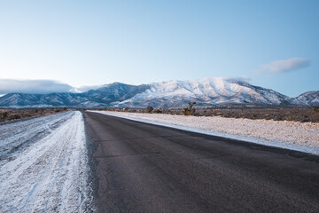 asphalt road in winter landscape