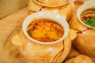 Recipe for baked meat with cheese and fresh vegetables in earthenware pots