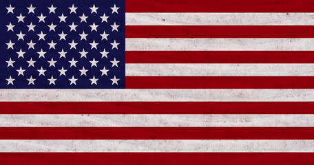 Stars and stripes distressed American flag with textured material background
