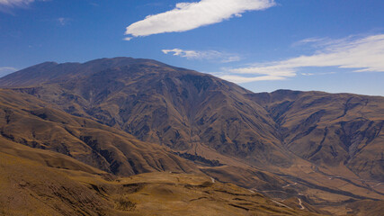 Fototapeta premium Aerial view of drones from Northern Argentina, mountains, valleys, routes and peaks.