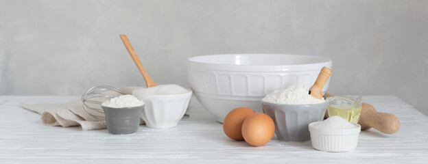 Ingredients for bakery butter flour, milk, oil, eggs, sugar, kitchen accessories