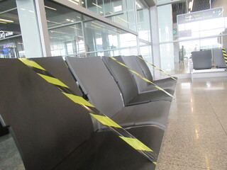 Empty chairs in airport due to covid-19