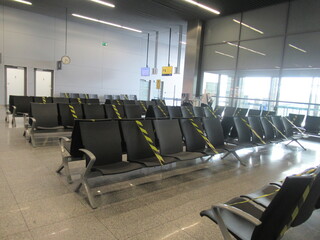 Empty chairs in airport due to covid-19
