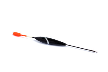 Fishing float with a long keel, for fishing rods on a white background, close-up