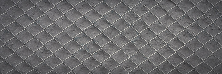 Metal mesh texture. Pattern of metal grid on a gray background. Perfect for design.