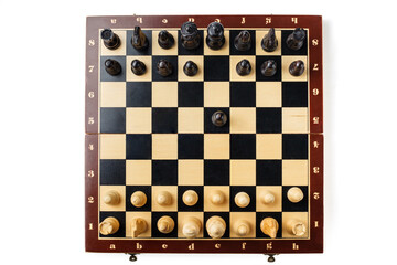 The option proposed by the Australian radio station, Black goes first. Wooden chess. Chess pieces...