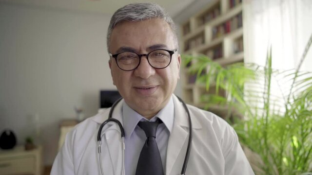 Doctor talking at the camera