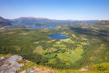 Fototapeta na wymiar On a hike to the mountain Hongfjellet Tosen, Velfjord Northern Norway - view to the Vassbygda