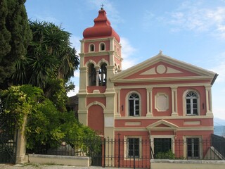 Fototapeta na wymiar Red church of Panagia Mandrakina, Kerkyra (Corfu Town), Corfu island, Greece