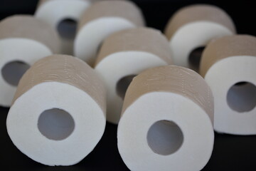 roll of toilet paper on black background