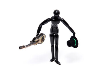 One black wooden mannequin as a musician isolated on white.Studio shot.