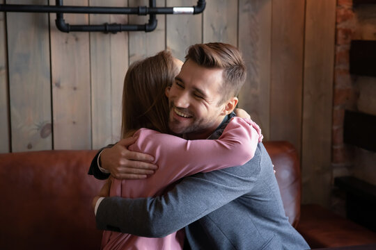 Wife Told About Pregnancy Happy Husband Squeezed Her In Hug Sit In Cafe At Date First Time Parents, Great News. Friends Glad To See Each Other Miss After Long Separation Meet In Cafeteria And Cuddling