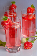 Red strawberry compote in glass glasses