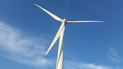 wind turbine against blue sky