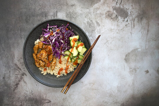 Korean Chicken Bulgogi Bowl with Brown Rice, Cabbage and Cucumber
