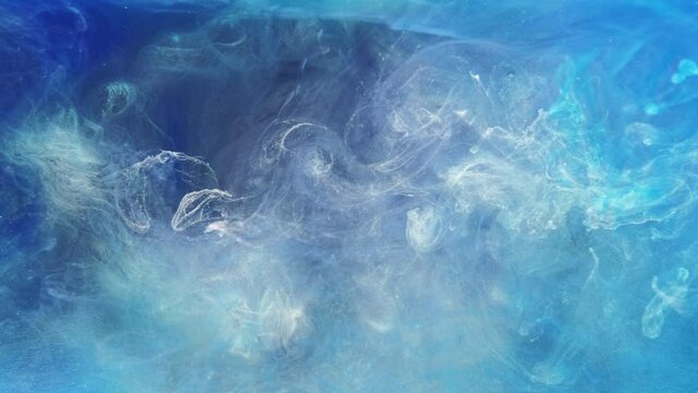Color smoke flow. Ethereal cloud. Blue white glitter fog motion abstract background.