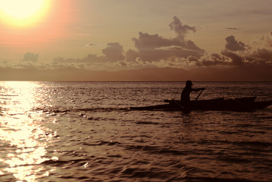 Silouhette Of Boat At Sunset