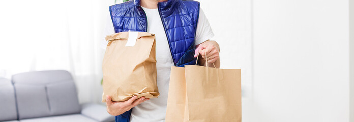 food delivery man Wearing Medical Mask. Corona Virus Concept