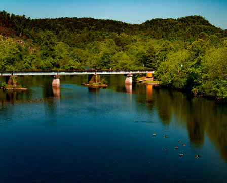 Train bridge over river beautiful drive on winding roads Ocoee River Tennessee North Carolina Georgia