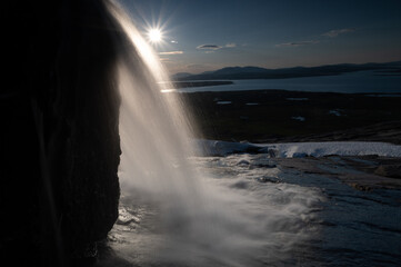 Waterfall in the sun in Stugudal, Norway