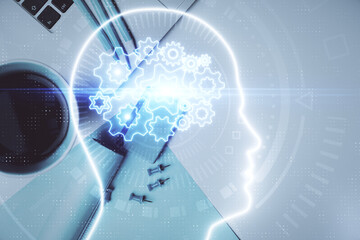 Multi exposure of brain sketch hologram over topview work table background with computer. Concept...