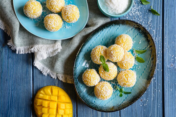 Mango Coconut Ladoo – sweet balls made of mango puree, desiccated coconut and condensed milk